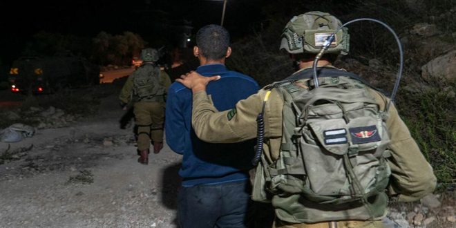 Israeli occupation forces arrest two Palestinians in the West Bank